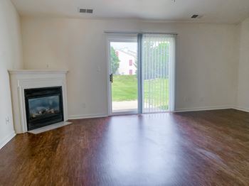 Gas fireplace with decorative mantel at Barton Farms in Greenwood, IN